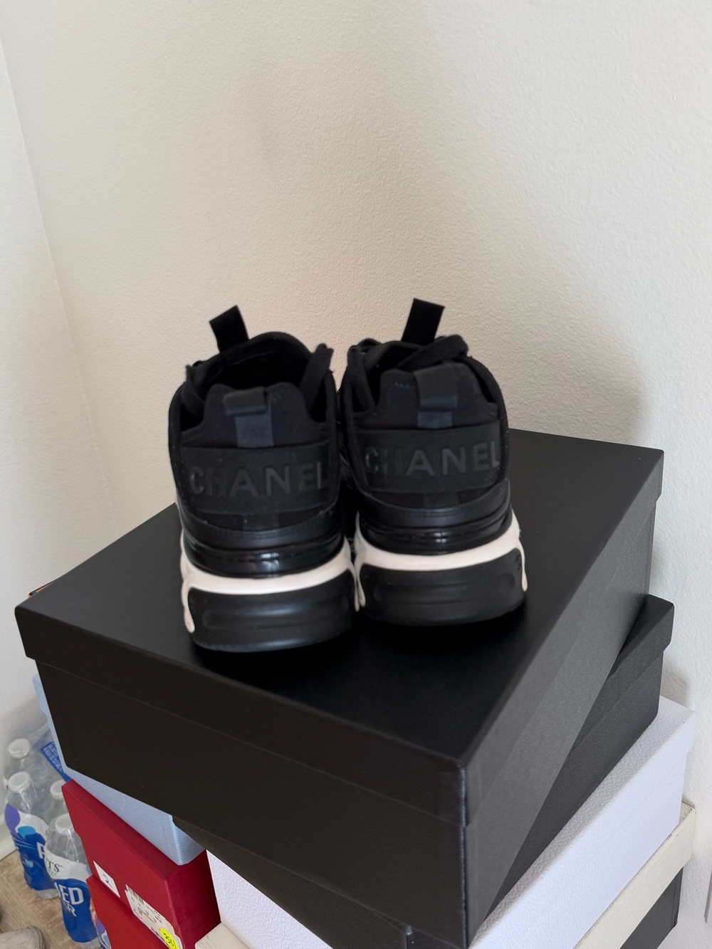 CHANEL Black and White Quilted-Sole Sneakers with Gold CC - Picture 5 of 8